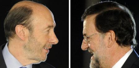 Combinación de fotografías de Rubalcaba y Rajoy, durante la noche del debate cara a cara