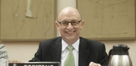 Cristobal Montoro sonríe en la Comisión de Economía del Congreso.