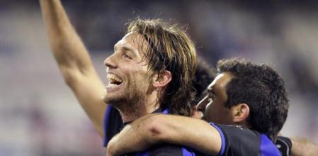 Michu celebra uno de sus goles contra el Madrid