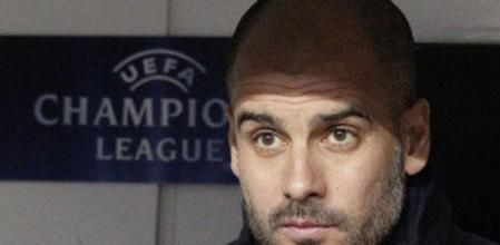 El técnico del Barcelona Josep Guardiola mira el partido de su equipo frente al Bayern Leverkusen desde el banquillo