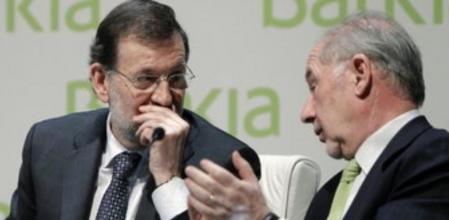 El presidente del Gobierno, Mariano Rajoy, y el presidente de Bankia, Rodrigo Rato