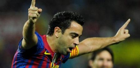 Xavi y Messi pusieron los goles en la primera parte