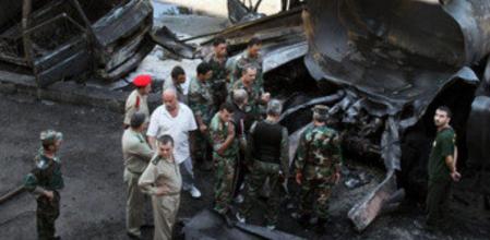 Estado de los alrededores del hotel donde se alojan los observadores de la ONU en Damasco tras el atentado de esta mañana