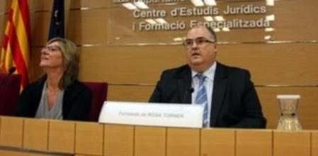 El vicepresidente del Consejo General del Poder Judicial, Fernando de Rosa, junto a la consellera de Justícia, Pilar Fernández Bozal