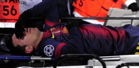 Leo Messi ha abandonado el terreno de juego en camilla tras un golpe con el portero del Benfica