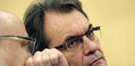 El presidente de la Generalitat, ArturMas, conversa con Lluis Maria Corominas, durante el Consell Nacional del CDC.