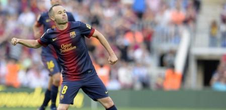 Andrés Iniesta durante el partido de Liga frente al Málaga en el Camp Nou