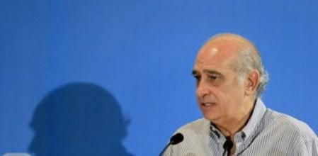 El ministro del Interior, Jorge Fernández Díaz, durante su intervención en el Fórum de Inmigración que el partido ha organizado hoy en L'Hospitalet de Llobregat