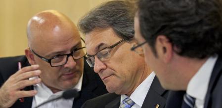 Lluís Corominas y Josep Rull, hombres fuertes de CDC, junto al presidente de la Generalitat y del partido, Artur Mas