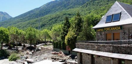 Imagen de uno de los campings más afectados por el desbordamiento del cauce del río Garona en la Val d'Aran del pasado junio.