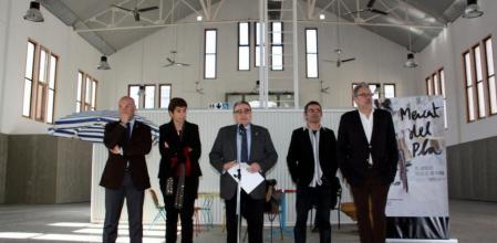 El alcalde de Lleida, Àngel Ros, junto al reponsable de Jamstores, Jordi Ribaudí, y otros representantes municipales durante la presentación del nuevo Mercat del Pla