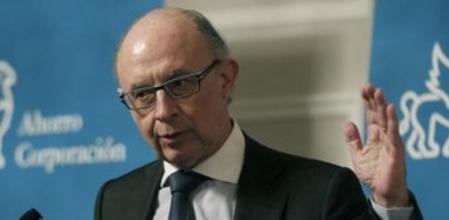 El ministro de Hacienda y Administraciones Públicas, Cristóbal Montoro, durante su intervención en un almuerzo de Ahorro Corporación celebrado hoy en Madrid.