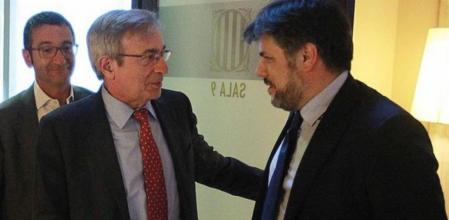 Los diputados Xavier Sabater (PSC) y Albert Batet (CiU), en el Parlament