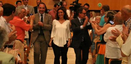 Mercè Conesa acompañada por el conseller de Interior, Ramon Espadaler y el presidente de la Generalitat, Artur Mas.
