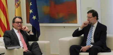 El president de la Generalitat, Artur Mas, junto al presidente del Gobierno de España, Mariano Rajoy.