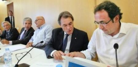 El presidente de la Generalitat, Artur Mas, y el coordinador general de CDC, Josep Rull, durante la reunión de la Ejecutiva de Convergència, la primera tras el paréntesis estival.