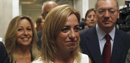 El ministro de Justicia, Alberto Ruiz-Gallardón, y la exministras Carmen Chacón y Trinidad Jiménez (detrás) a su llegada a una conferencia del titular de Asuntos Exteriores y de Cooperación, José Manuel García Margallo