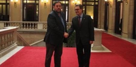 Mas y Junqueras, antes de reunirse en el Parlament.
