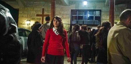Una joven iraquí caldeo-católica, después de cantar en una función navideña con el coro de la iglesia de San Elías de Irbil