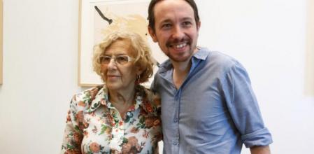 Manuela Carmena, alcaldesa de Madrid, y Pablo Iglesias, secretario general de Podemos