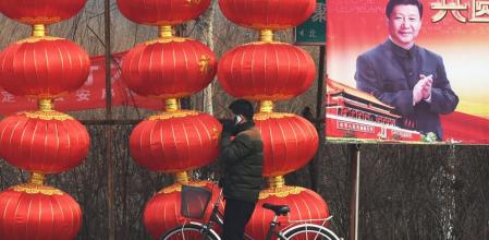 Xi Jiping, primer ministro, en una valla en el centro de Pekín.