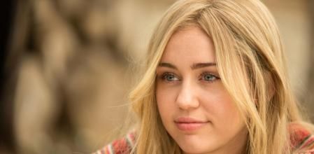 This image released by Amazon Prime Video shows Miley Cyrus in a scene from, "Crisis in Six Scenes." (Jessica Miglio/Amazon Prime Video via AP)