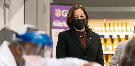 Vice President Kamala Harris watches as physician Linval Matthews, left, administers a Moderna COVID-19 vaccine to Brenda Thompson, right, at a Giant Foods grocery store, Thursday, Feb. 25, 2021, in Washington, as Delegate Eleanor Holmes Norton, D-D.C., background right, looks on. (AP Photo/Andrew Harnik)