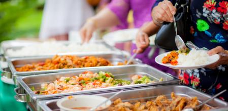 Food Buffet Catering Dining Eating Party Sharing Concept.people group catering buffet food indoor in luxury restaurant with meat colorful fruits and vegetables