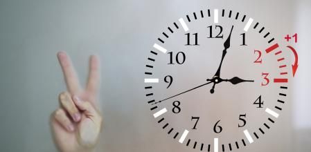 Daylight Saving Time. DST. Wall Clock going to winter time. Turn time forward. Abstract photo of changing time at spring. (Daylight Saving Time. DST. Wall Clock going to winter time. Turn time forward. Abstract photo of changing time at spring., ASCII