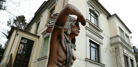 RADEBEUL, GERMANY - FEBRUARY 22: A statue of an American Indian stands in front of the Karl May Museum, which is also the former residence of 19th-century German writer Karl May, on February 22, 2017 in Radebeul, Germany. May's Wild West series, with its protaganists of Old Shatterhand and Winnetou, is an indelible facet of central European childhood literature and has sold millions of copies worldwide. May was born on February 25, 1842 and his 175th birthday occurs this coming Saturday. (Photo by Sean Gallup/Getty Images)