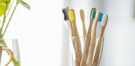 Toothbrushes in a glass