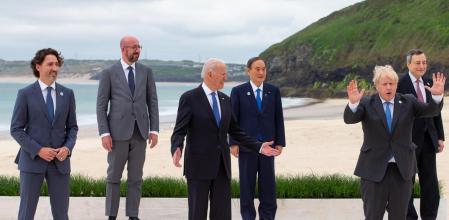 CARBIS BAY, CORNWALL - JUNE 11: (L-R) Canadian Prime Minister Justin Trudeau, President of the European Council Charles Michel, US President Joe Biden, Japanese Prime Minister Yoshihide Suga, British Prime Minister Boris Johnson and Italian Prime Minister Mario Draghi pose for the Leaders official welcome and family photo during the G7 Summit In Carbis Bay, on June 11, 2021 in Carbis Bay, Cornwall. UK Prime Minister, Boris Johnson, hosts leaders from the USA, Japan, Germany, France, Italy and Canada at the G7 Summit. This year the UK has invited India, South Africa, and South Korea to attend the Leaders' Summit as guest countries as well as the EU. (Photo by Jonny Weeks - WPA Pool / Getty Images)
