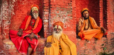In Hinduism, sadhu, or shadhu is a common term for a mystic, an ascetic, practitioner of yoga (yogi) and/or wandering monks. The sadhu is solely dedicated to achieving the fourth and final Hindu goal of life, moksha (liberation), through meditation and contemplation of Brahman. Sadhus often wear ochre-colored clothing, symbolizing renunciation.
