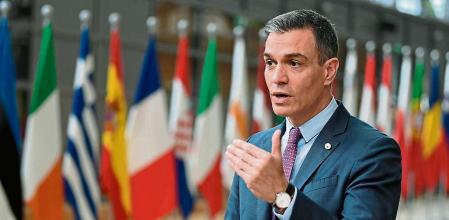 Spanish Prime Minister Pedro Sanchez talks to journalists as he arrives for an EU summit at the European Council building in Brussels, Thursday, June 24, 2021. At their summit in Brussels, EU leaders are set to take stock of coronavirus recovery plans, study ways to improve relations with Russia and Turkey, and insist on the need to develop migration partners with the countries of northern Africa, but a heated exchange over a new LGBT bill in Hungary is also likely. (John Thys, Pool Photo via AP)