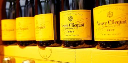 FILE PHOTO: Bottles of French Veuve Clicquot champagne are offered at a supermarket of Swiss retail group Coop in Zumikon, Switzerland December 13, 2016. REUTERS/Arnd Wiegmann//File Photo