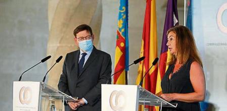 (I-D) El presidente de la Generalitat, Ximo Puig, y la presidenta balear, Francina Armengol, comparecen ante los medios durante una rueda de prensa celebrada en la clausura de la I cumbre entre Baleares y Comunitat Valenciana, a 6 de julio de 2021, el Palacio de Congresos de Palma de Mallorca, Mallorca, Islas Baleares, (España). El encuentro entre los dirigentes de la Comunitat Valenciana y las Islas Baleares, que concluye este martes tras dos sesiones, ha tenido como objetivo el acercamiento de los vínculos culturales, sociales y económicos de ambas autonomías. 06 JULIO 2021;MALLORCA;ISLAS BALEARES;CLAUSURA;I CUMBRE;COMUNITAT VALENCIANA Isaac Buj / Europa Press 06/07/2021