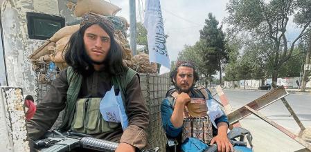 Members of Taliban forces sit at a checkpost in Kabul, Afghanistan August 17, 2021. REUTERS/Stringer NO RESALES. NO ARCHIVES