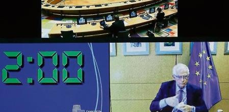 European Union foreign policy chief Josep Borrell, screen top right, speaks with EU foreign ministers and representatives as he takes part in an extraordinary Foreign Affairs Council, via video link, at the European Council building in Brussels, Tuesday, Aug. 17, 2021. European Union foreign policy chief Josep Borrell called the extraordinary video conference of foreign affairs ministers to take stock of the situation in Afghanistan. (Johanna Geron, Pool Photo via AP)