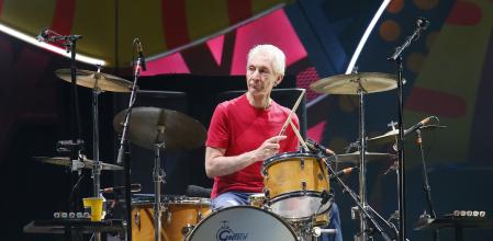Charlie Watts of British veteran rockers The Rolling Stones performs with his band members Mick Jagger, Keith Richards, and Ronnie Wood during a concert on their 