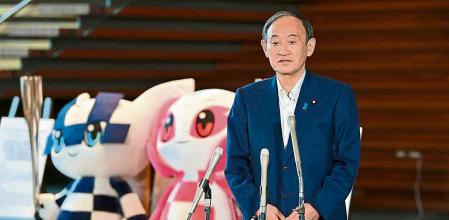Japan's Prime Minister Yoshihide Suga speaks during a press conference at the prime minister's office in Tokyo on September 3, 2021, following his announcement that he will not seek re-election for Liberal Democratic Party (LDP) leadership this month. (Photo by Kazuhiro NOGI / AFP)