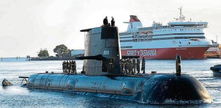 TASMANIA, AUSTRALIA - APRIL 22: In this handout image provided by the Australian Defence Force, Royal Australian Navy submarine HMAS Sheean arrives in Devonport on April 22, 2021 in Tasmania, Australia. Australia, the United States and the United Kingdom have announced a new strategic defence partnership - known as AUKUS - to build a class of nuclear-propelled submarines and work together in the Indo-Pacific region. The new submarines will replace the Royal Australian Navy's existing Collins submarine fleet. (Photo by POIS Andrew Dakin/Australian Defence Force via Getty Images)