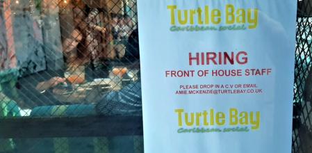 Cartel de oferta de trabajo.