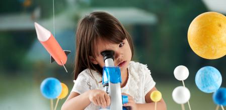 Curious little girl looking through microscope while having fun in scientific club for preschoolers, blurred background (Curious little girl looking through microscope while having fun in scientific club for preschoolers, blurred background, ASCII, 12