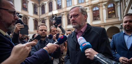 Petr Fiala (C), the leader of Civic Party (ODS) and Together's (SPOLU) coalition candidate for prime minister talks to journalists before meeting with another chiefs of the parliamentary parties, at Senate in Prague, Czech Republic, 19 October 2021.
