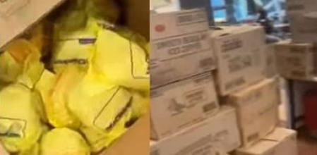 Una empleada muestra el pedido más grande de McDonald’s jamás hecho en tan poco tiempo