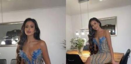 La modelo posando con el que iba a ser su vestido