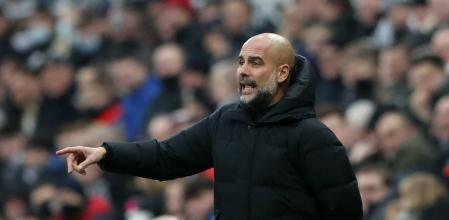 Soccer Football - Premier League - Newcastle United v Manchester City - St James' Park, Newcastle, Britain - December 19, 2021  Manchester City manager Pep Guardiola reacts REUTERS/Scott Heppell EDITORIAL USE ONLY. No use with unauthorized audio, video, data, fixture lists, club/league logos or 'live' services. Online in-match use limited to 75 images, no video emulation. No use in betting, games or single club /league/player publications.  Please contact your account representative for further details.