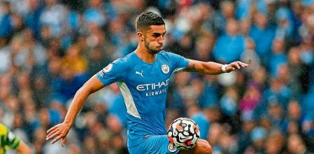 (FILES) In this file photo taken on August 21, 2021 Manchester City's Spanish midfielder Ferran Torres controls the ball during the English Premier League football match between Manchester City and Norwich City at the Etihad Stadium in Manchester, north west England. - Barcelona have agreed a fee worth an initial 55 million euros ($62 million, £47 million) for Manchester City forward Ferran Torres, according to reports in Spain and England on December 22, 2021. (Photo by Adrian DENNIS / AFP) / RESTRICTED TO EDITORIAL USE. No use with unauthorized audio, video, data, fixture lists, club/league logos or 'live' services. Online in-match use limited to 120 images. An additional 40 images may be used in extra time. No video emulation. Social media in-match use limited to 120 images. An additional 40 images may be used in extra time. No use in betting publications, games or single club/league/player publications. /