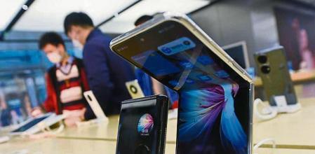 HANGZHOU, CHINA - DECEMBER 23: A foldable smartphone P50 Pocket is displayed for sale at a Huawei store on December 23, 2021 in Hangzhou, Zhejiang Province of China. (Photo by Long Wei/VCG via Getty Images)