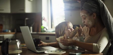 Photo of a mother and daughter having breakfast together in the kitchen